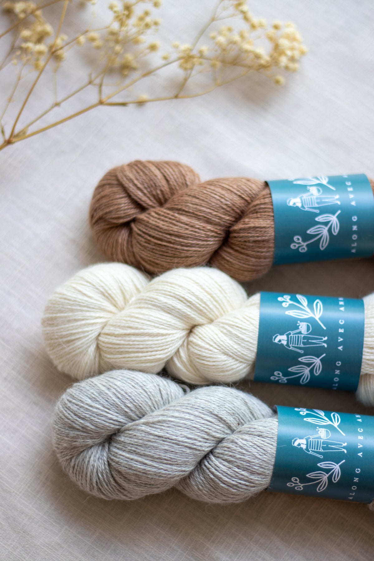 three skeins of alpaca/silk/cashmere yarn