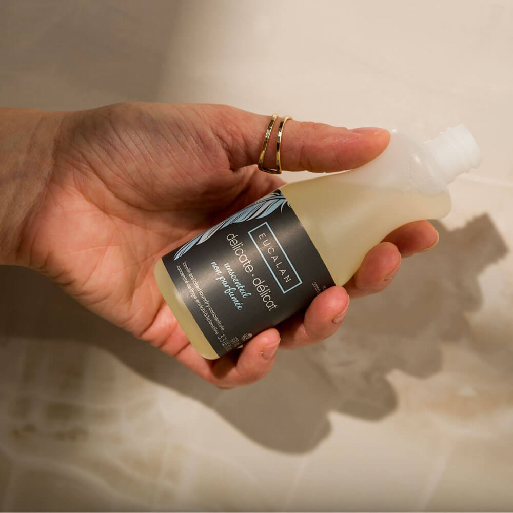 Eucalan Unscented Wool Wash 100 ml, bottle in hand